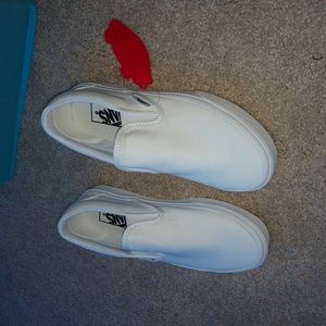 white slip on vans
